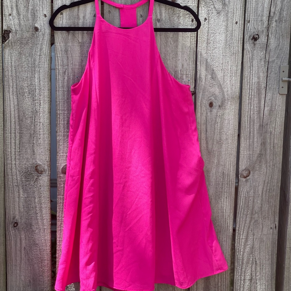 Gorgeous bright pink A-line dress with cutout detail.